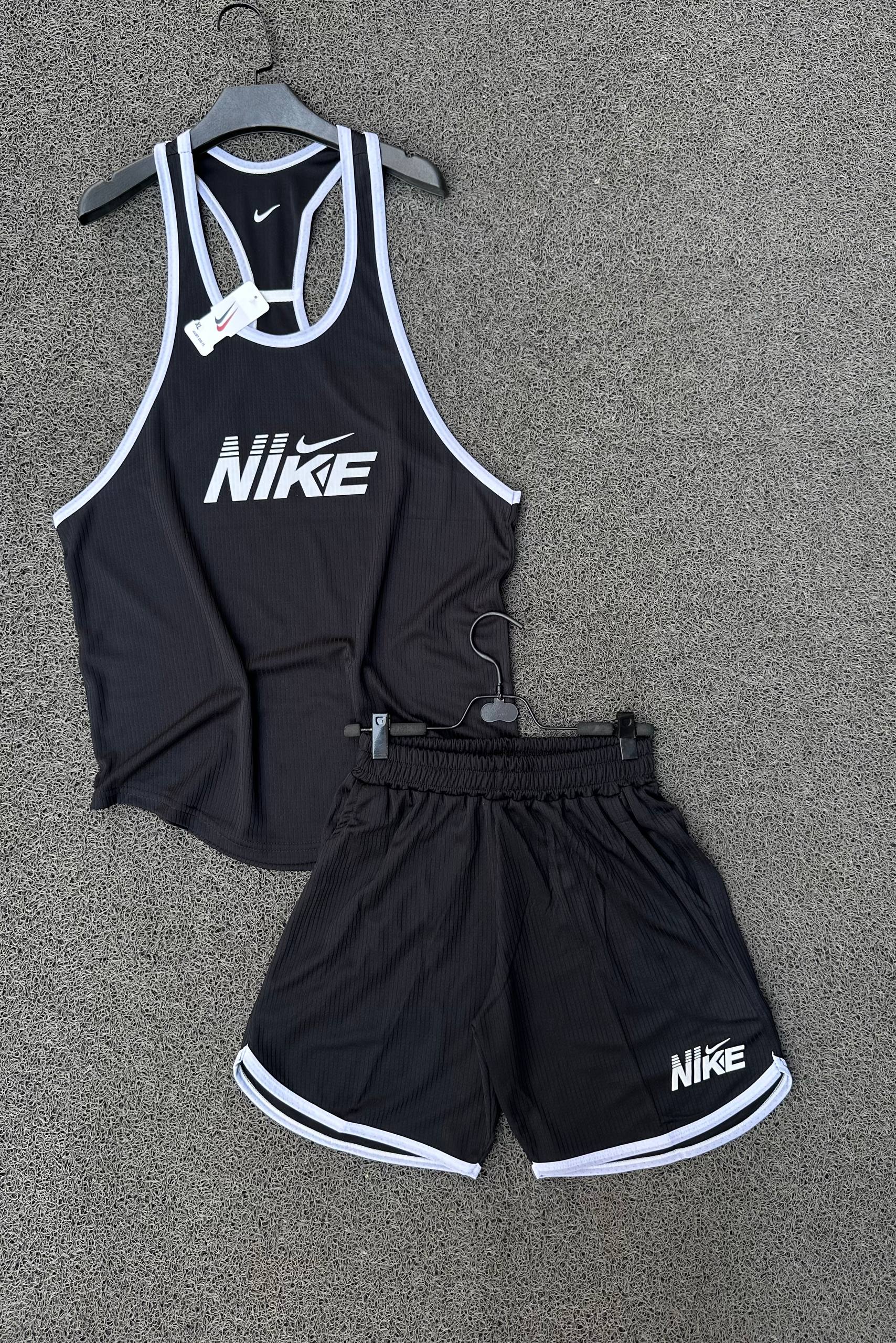 ست رکابی و شلوارگ قهرمانیnike/ست تاپ و شلوارک اقتصادی